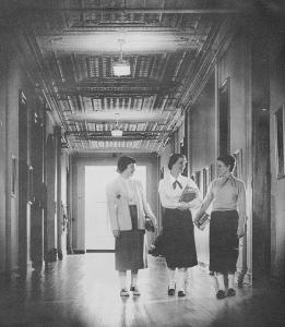 Girls in hall on old campus - from 1953 <em>Promenade</em> yearbook